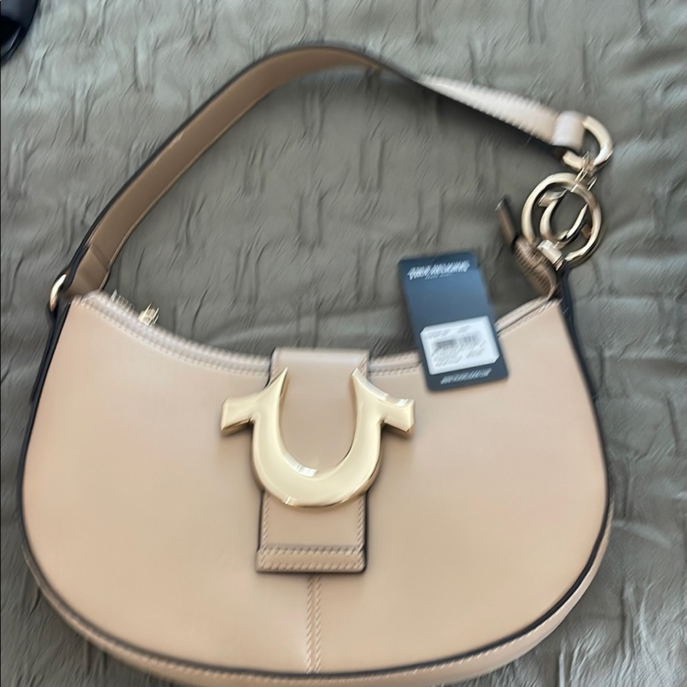 True religion, tan handbag, never used